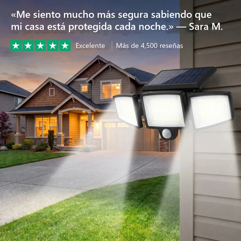 Luz solar de seguridad Lunor SolarGuard instalada en la fachada de una casa